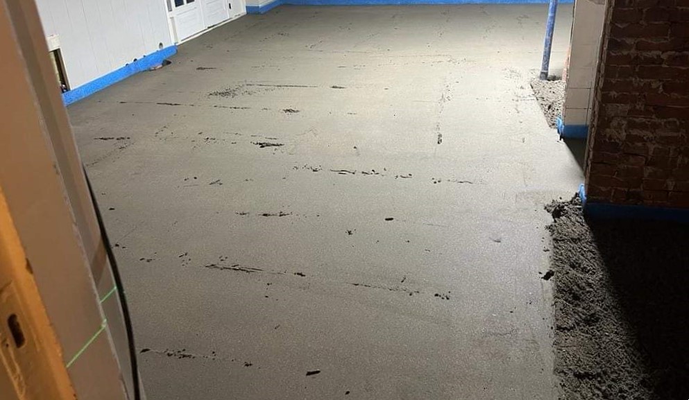Zandcement onder vloerverwarming